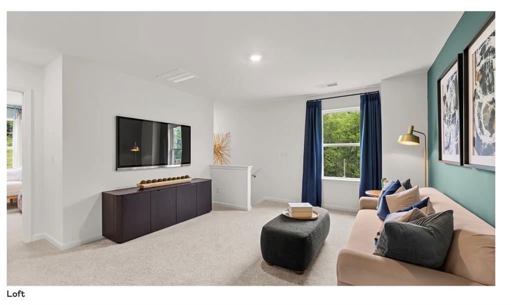 153 Saddlebred Way Rossville, GA 30741 - Photo 21 of 26 a living room with furniture and a flat screen tv