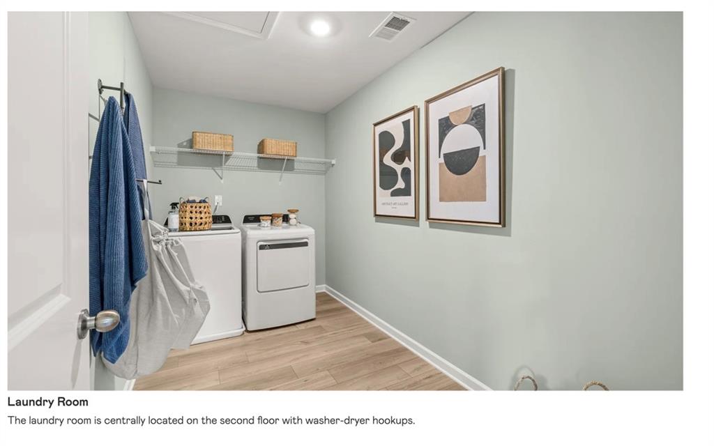 153 Saddlebred Way Rossville, GA 30741 - Photo 22 of 26 a utility room with dryer and washer