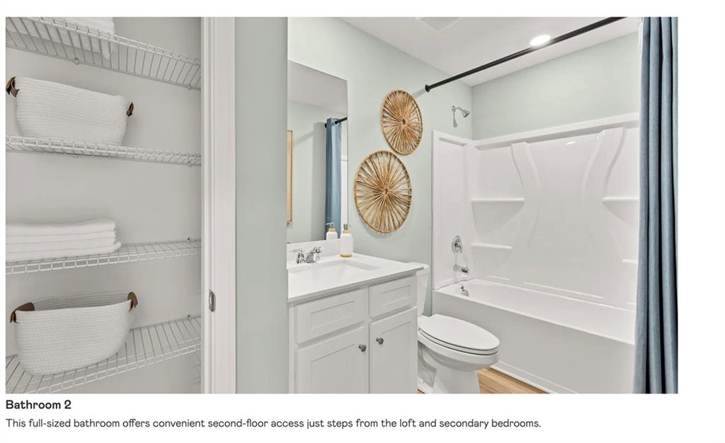 153 Saddlebred Way Rossville, GA 30741 - Photo 23 of 26 a bathroom with a toilet a sink and a bathtub