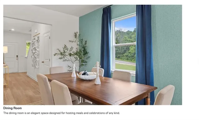 a living room with a table and window