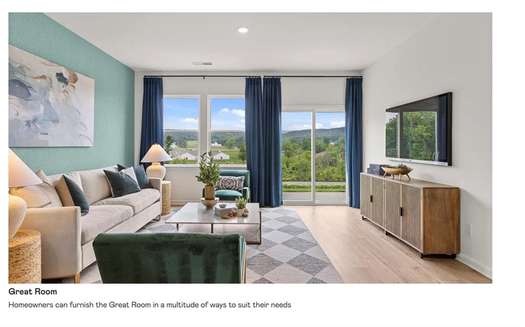 153 Saddlebred Way Rossville, GA 30741 - Photo 10 of 26 a living room with furniture and large windows