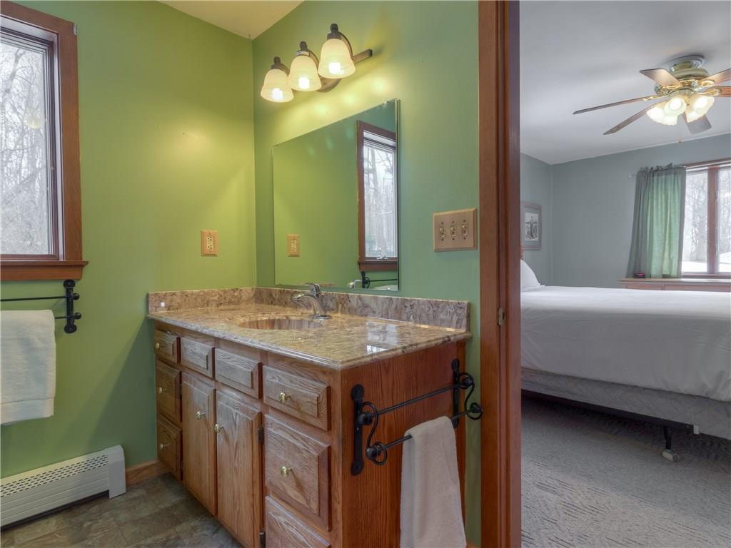 182 Church Road New Gloucester, ME 04260 - Photo 16 of 32 Master bedroom and bath