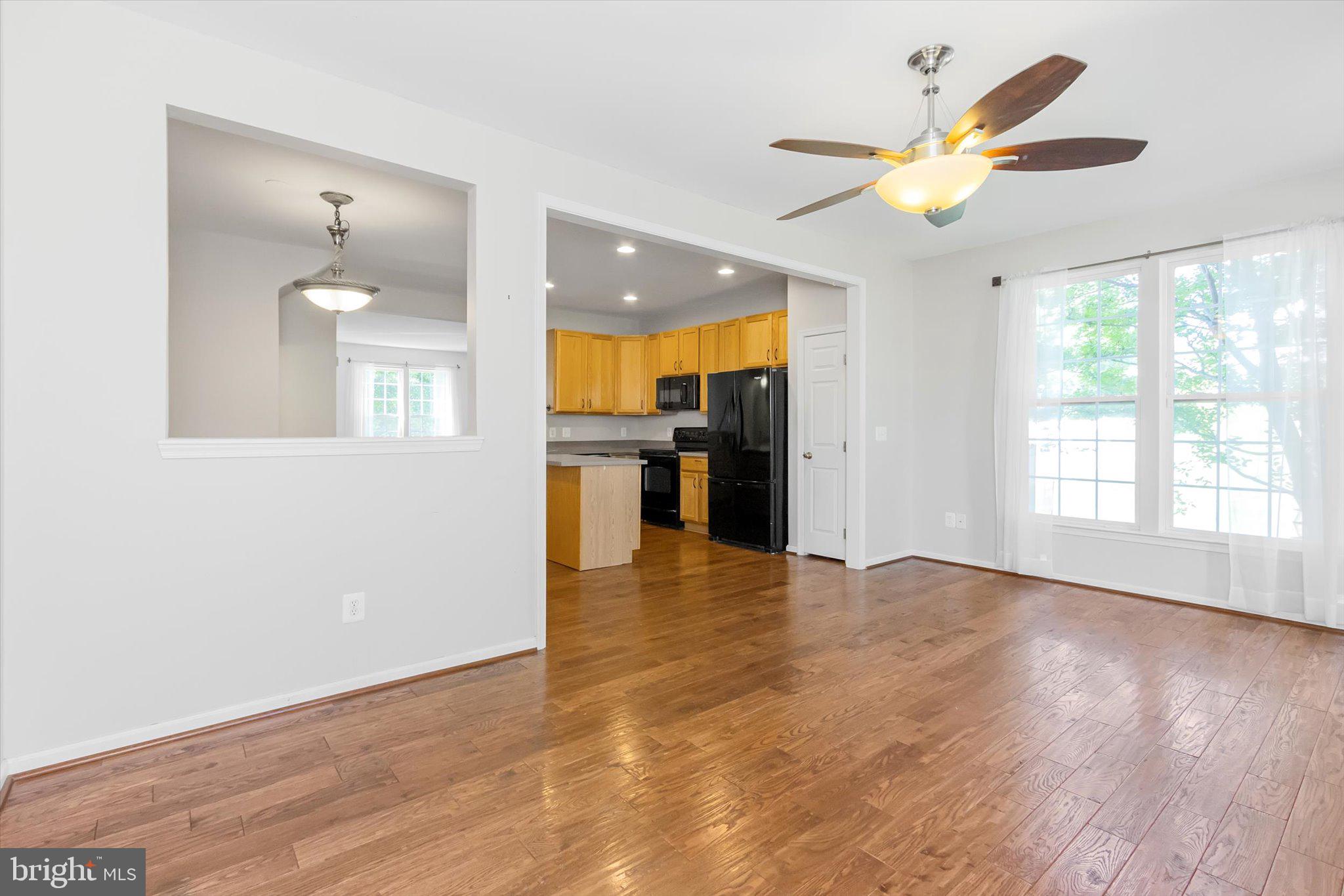 171 Riparian Lane Ranson, WV 25438 - Photo 29 of 53 Family Room view to Kitchen