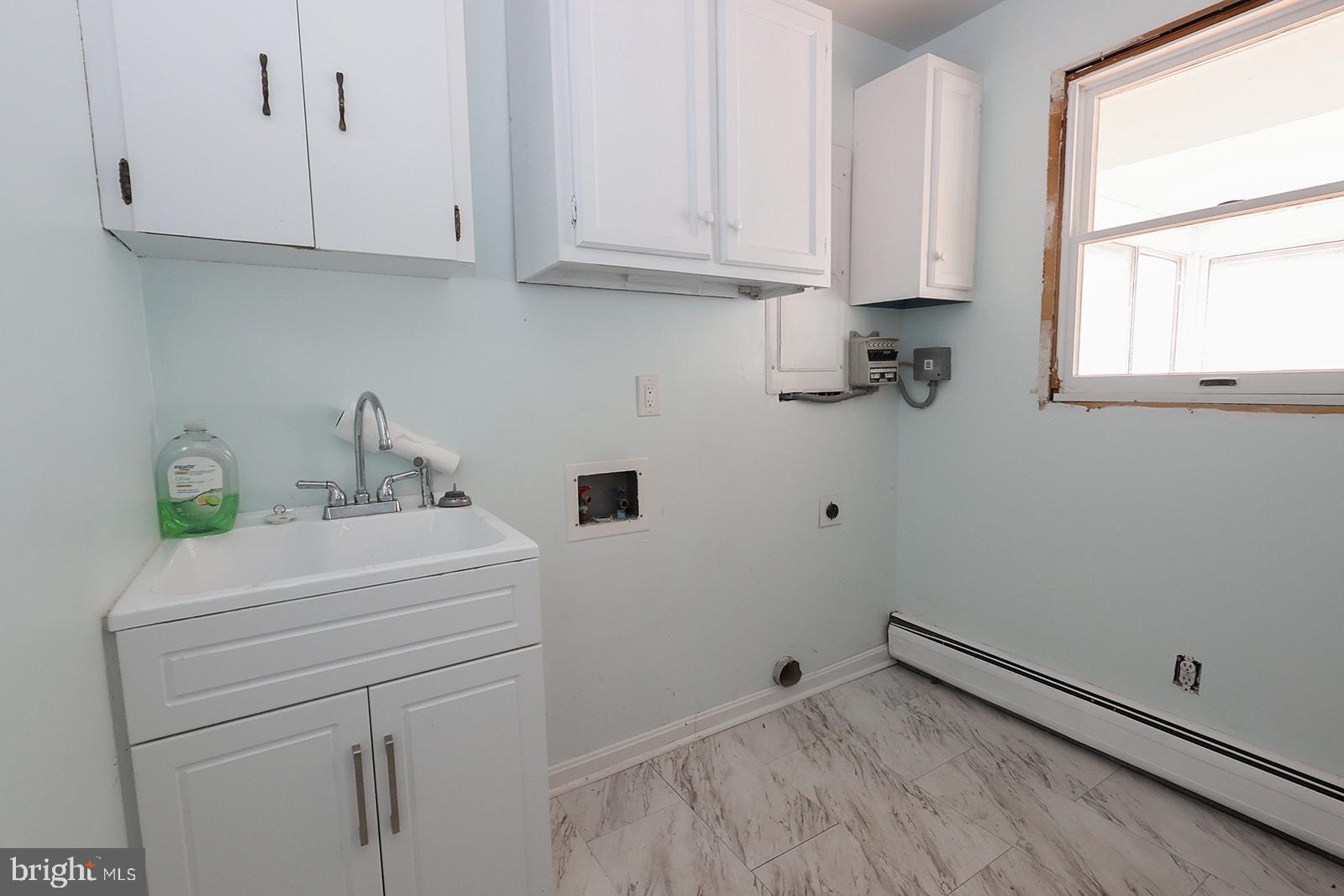 48146 Mallard View Lane St. Inigoes, MD 20684 - Photo 15 of 46 Bright and airy laundry space.