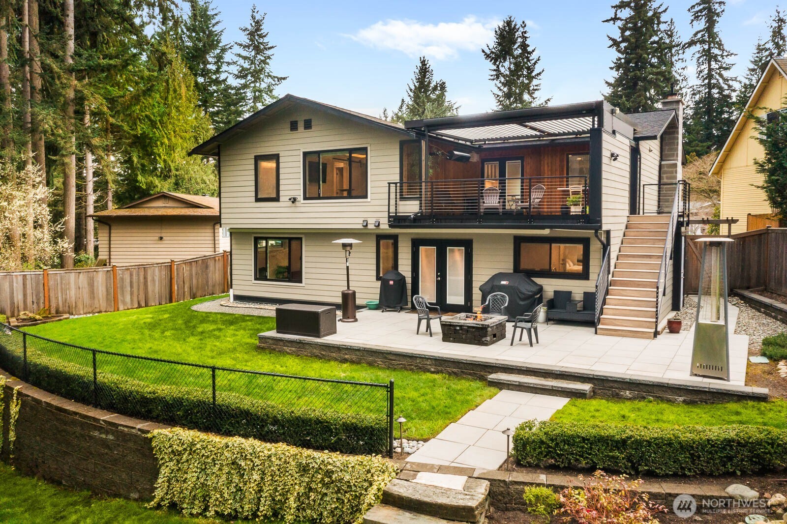 104 219th Place Southeast Bothell, WA 98021 - Photo 1 of 1 a view of a house with backyard sitting area and garden