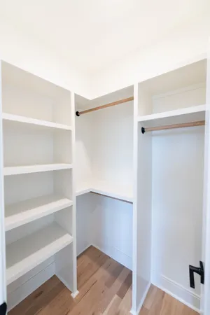 a view of an empty walk in closet