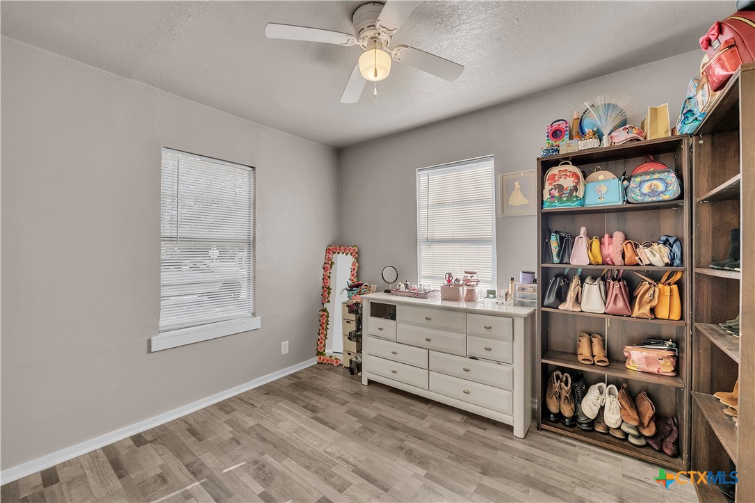 1001 West 8th Street Cameron, TX 76520 - Photo 15 of 20 a view of a workspace with furniture and toys