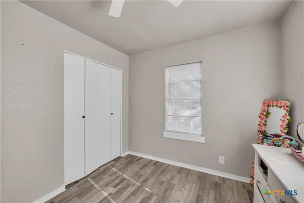 a room with toys and wooden floor