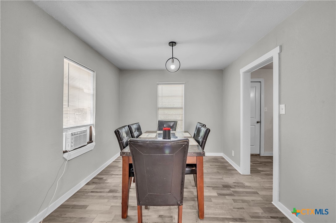 1001 West 8th Street Cameron, TX 76520 - Photo 7 of 20 a dining room with furniture and window