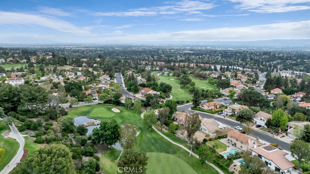 11677 Seminole Circle Porter Ranch, CA 91326 - Photo 15 of 69 an aerial view of city and lake