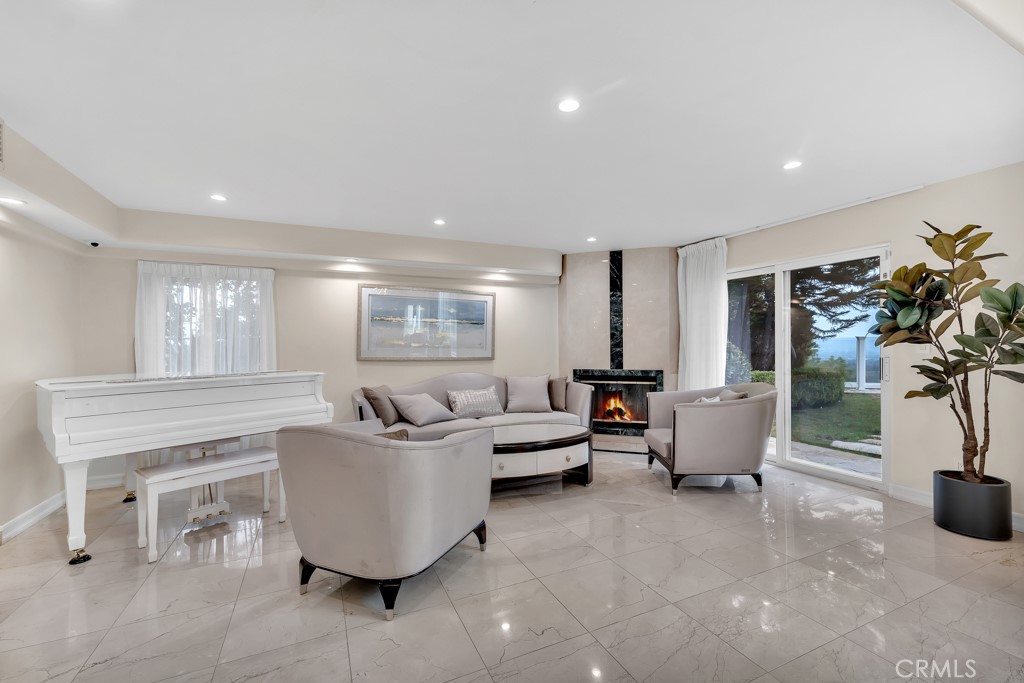 11677 Seminole Circle Porter Ranch, CA 91326 - Photo 22 of 69 a living room with furniture and a potted plant