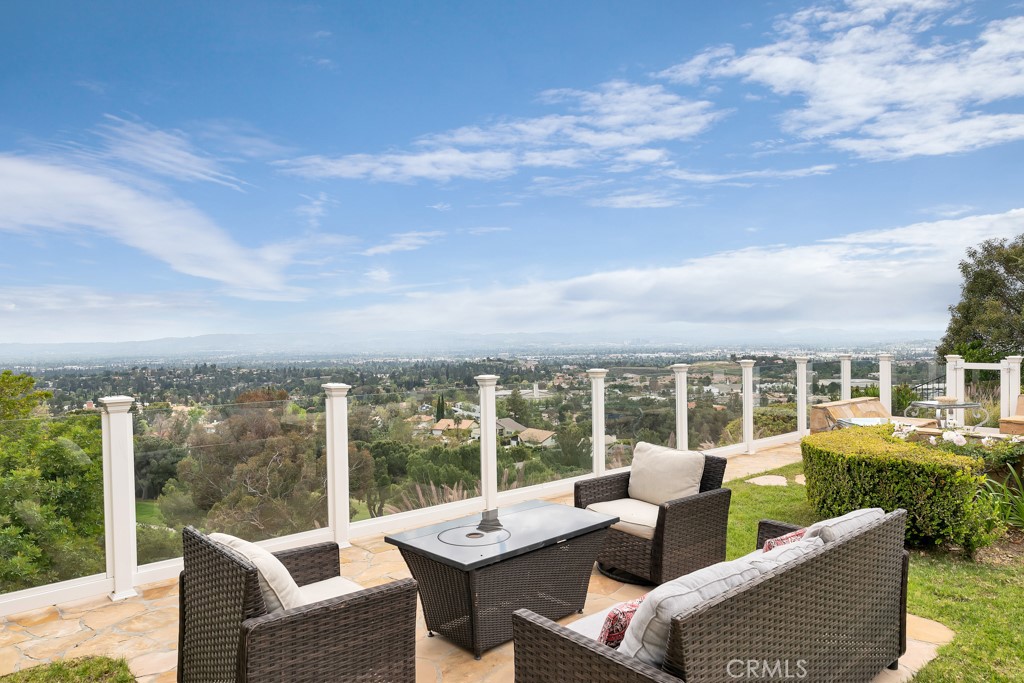 11677 Seminole Circle Porter Ranch, CA 91326 - Photo 40 of 69 a roof deck with couches and potted plants