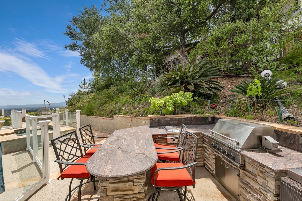 11677 Seminole Circle Porter Ranch, CA 91326 - Photo 45 of 69 an outdoor sitting area with furniture and city view