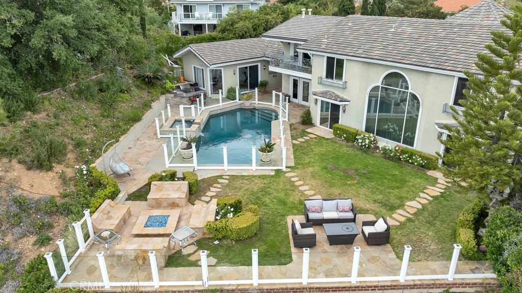 11677 Seminole Circle Porter Ranch, CA 91326 - Photo 5 of 69 a aerial view of a house with a yard