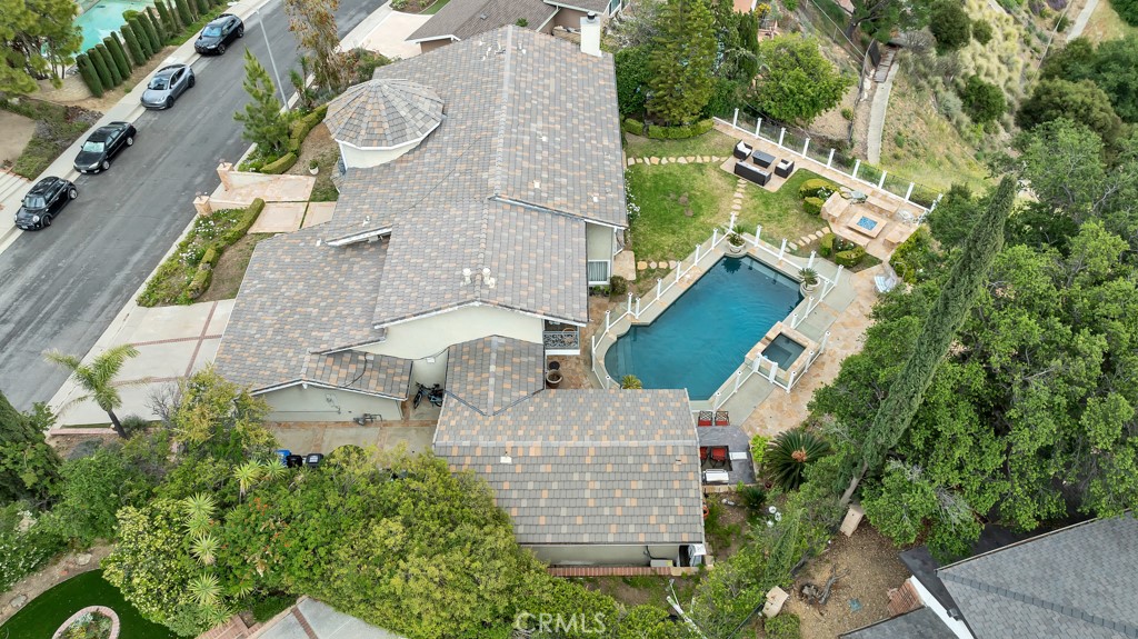 11677 Seminole Circle Porter Ranch, CA 91326 - Photo 6 of 69 an aerial view of a house with outdoor space and a lake view