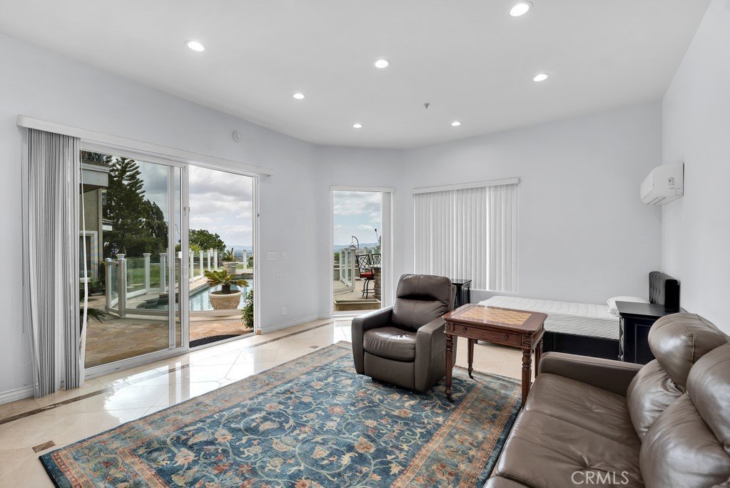 11677 Seminole Circle Porter Ranch, CA 91326 - Photo 67 of 69 a living room with furniture and a rug