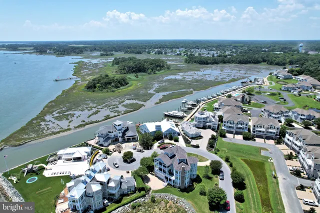 a view of a lake with a building in the background