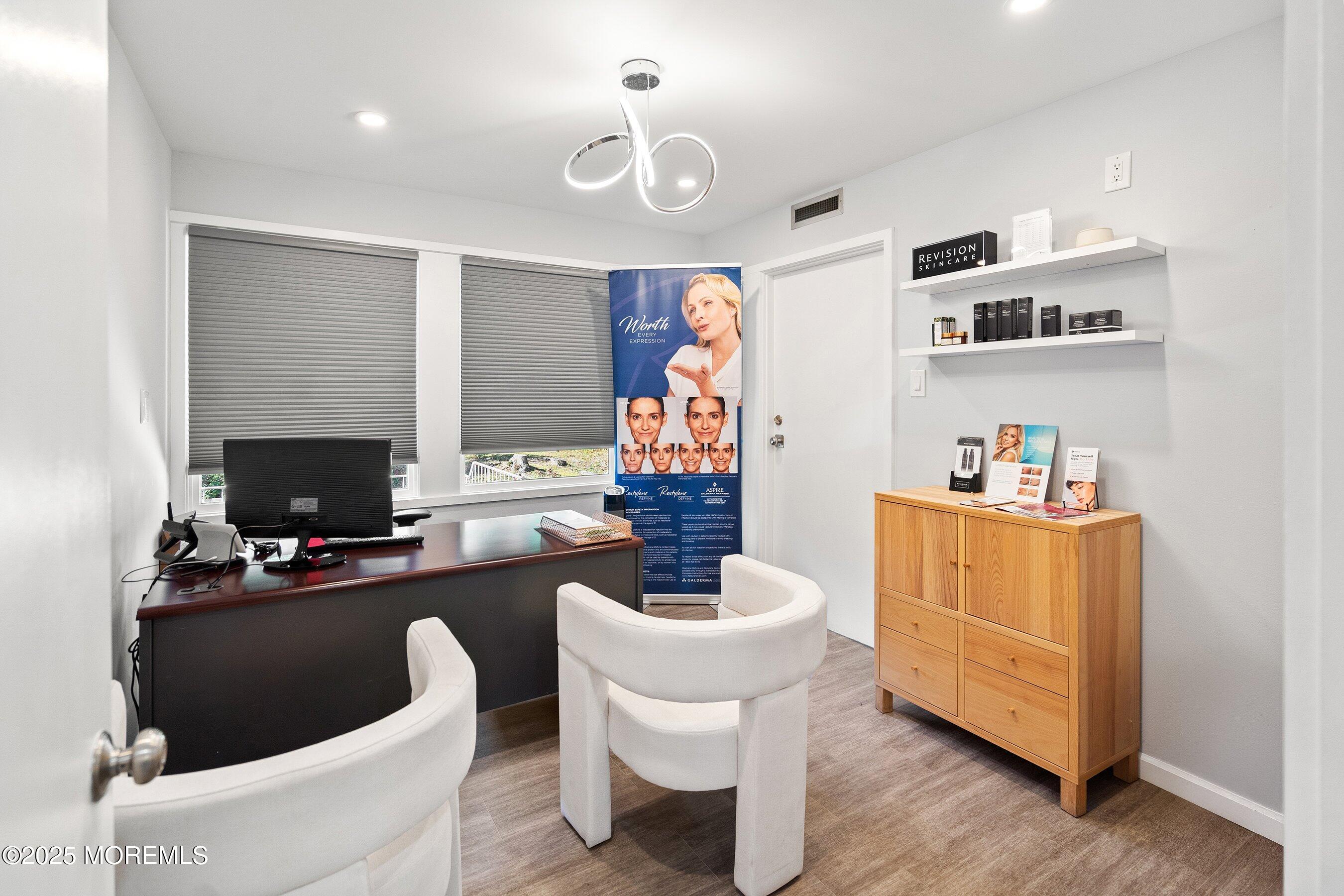 N Avenue East Cranford, NJ 07016 - Photo 12 of 31 a living room with furniture a piano and a flat screen tv