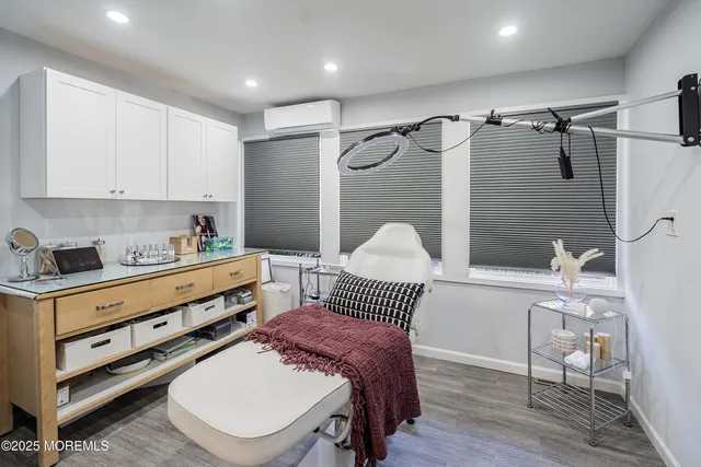 a spacious bathroom with a double vanity sink and a mirror