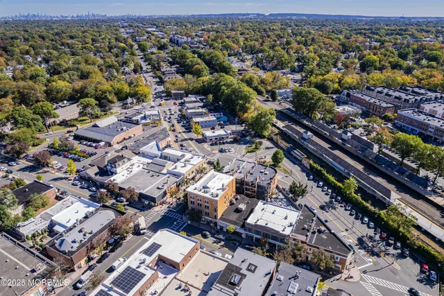 an aerial view of a city with lots of residential buildings