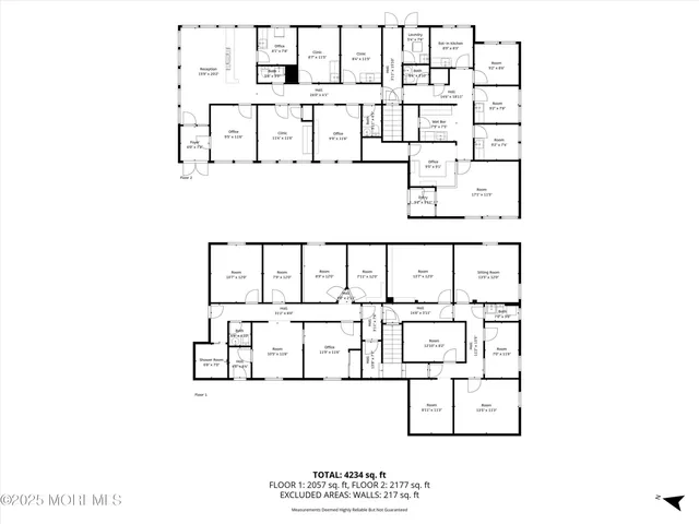 a picture of a bench in front of a wall