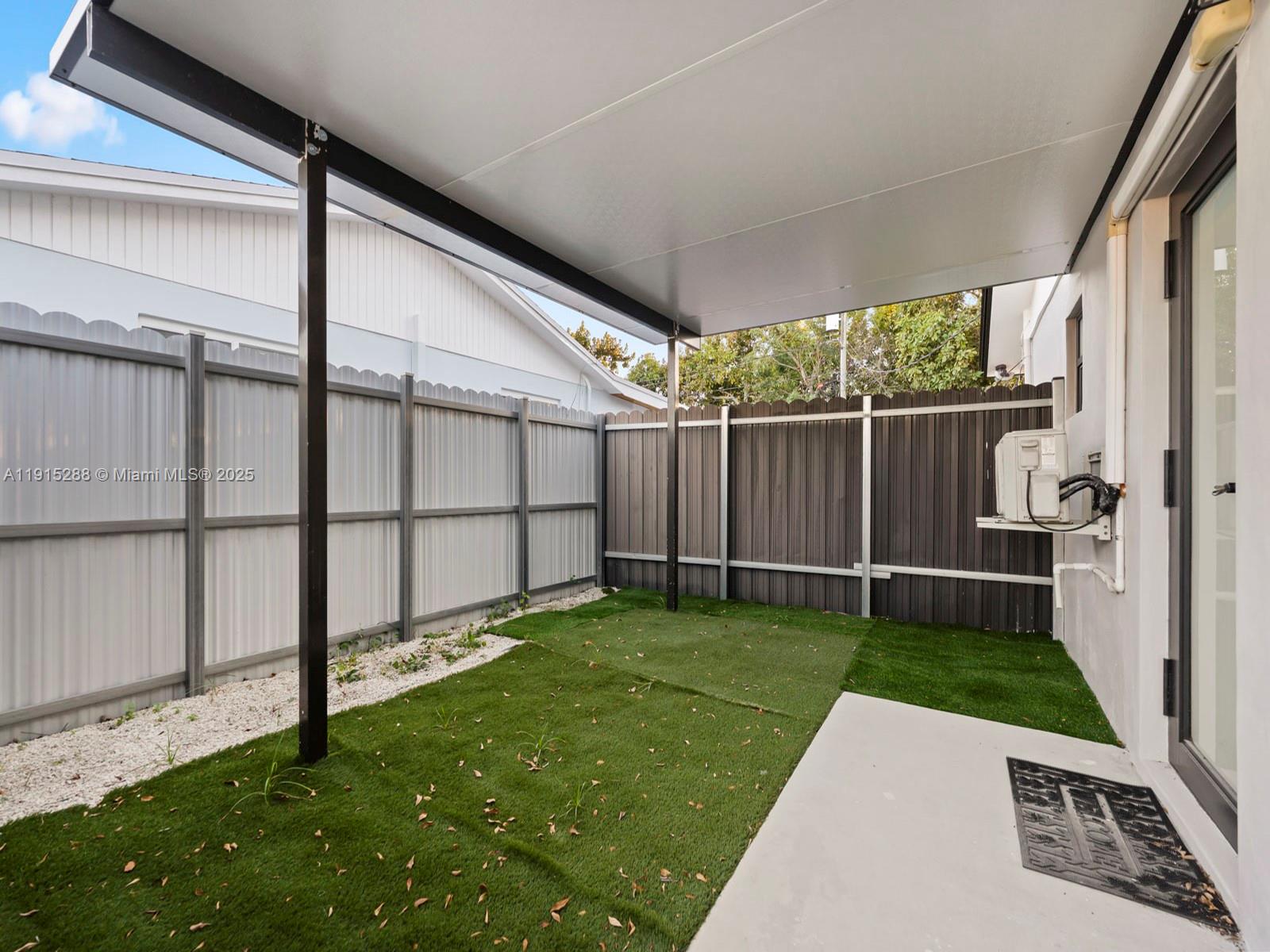 a view of a backyard with a garden