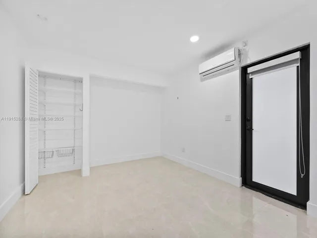 an empty room with closet