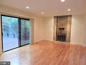 9217 Three Oaks Drive Silver Spring, MD 20901 - Photo 10 of 24 Living room and deck
