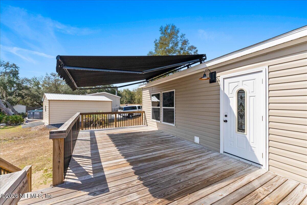 5533 Coronado Street Keystone Heights, FL 32656 - Photo 15 of 73 a front view of a house with wooden floor