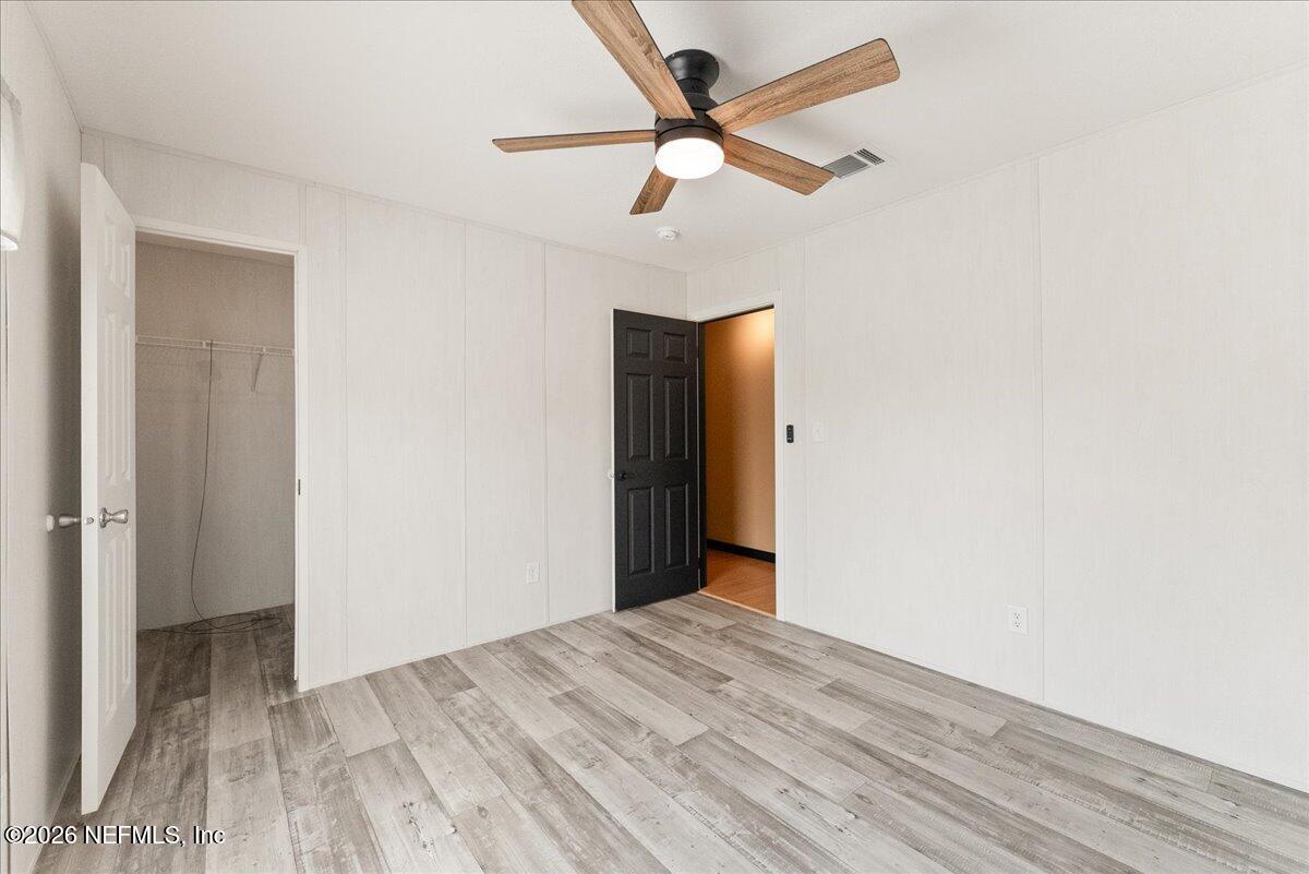 5533 Coronado Street Keystone Heights, FL 32656 - Photo 45 of 73 a view of a livingroom with a ceiling fan
