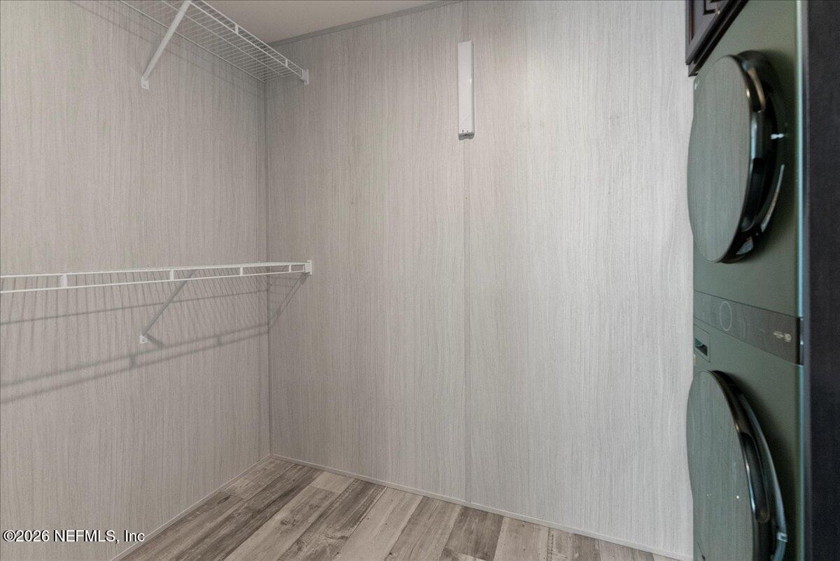 5533 Coronado Street Keystone Heights, FL 32656 - Photo 55 of 73 a view of storage and utility room with racks on the wall