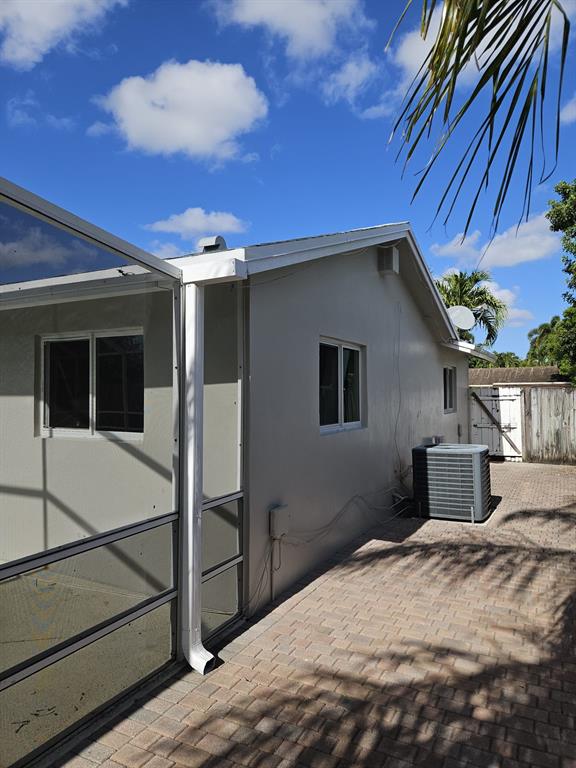 22761 Neptune Road Boca Raton, FL 33428 - Photo 12 of 14 a house with a outdoor space