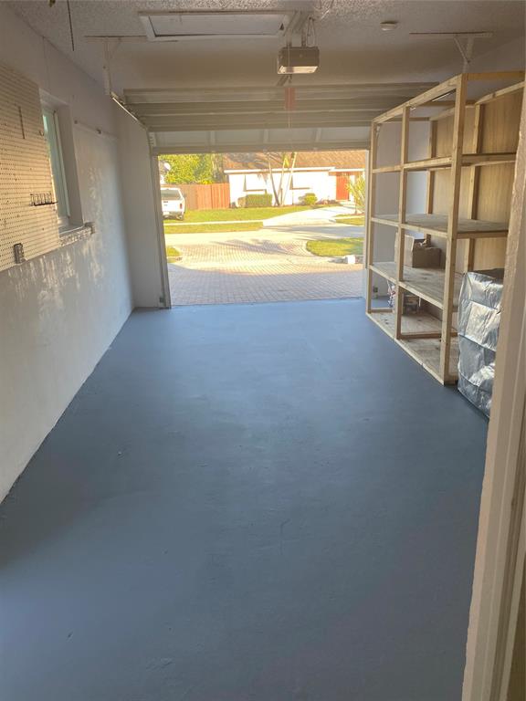 22761 Neptune Road Boca Raton, FL 33428 - Photo 14 of 14 a view of an empty room with a window