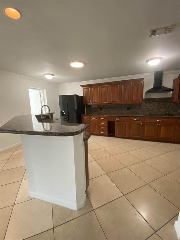 22761 Neptune Road Boca Raton, FL 33428 - Photo 4 of 14 a kitchen with granite countertop a sink and cabinets