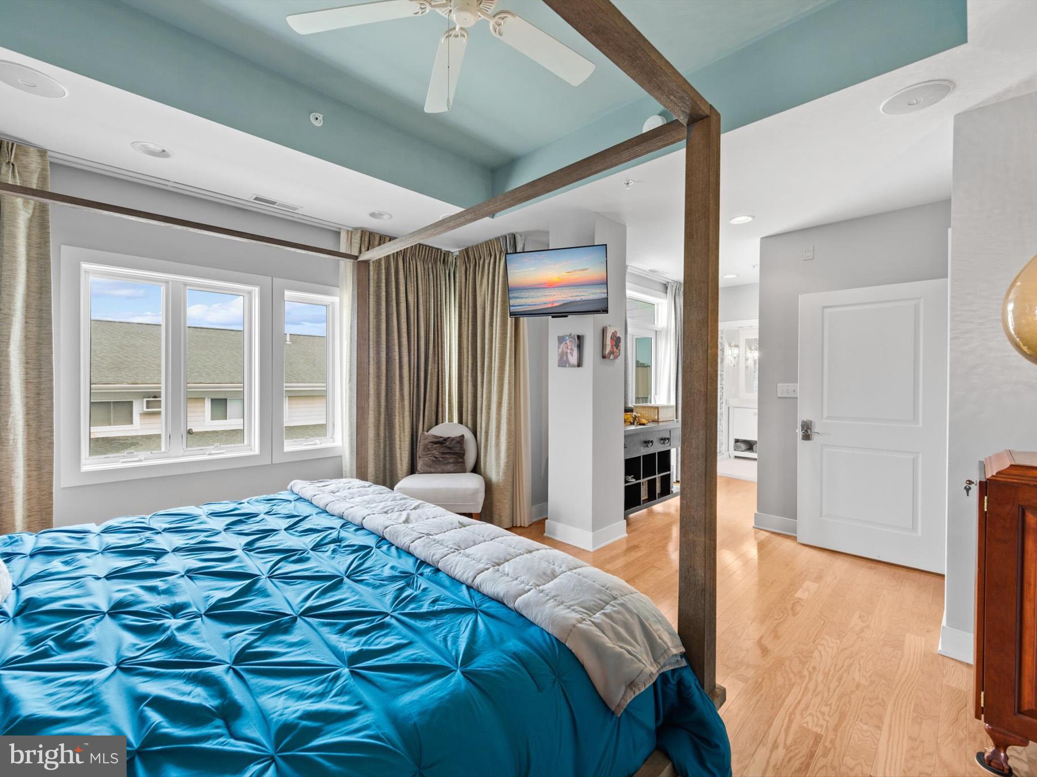 5 87th Street, Unit 303 Ocean City, MD 21842 - Photo 23 of 49 a bedroom with a bed and a large window with outer view