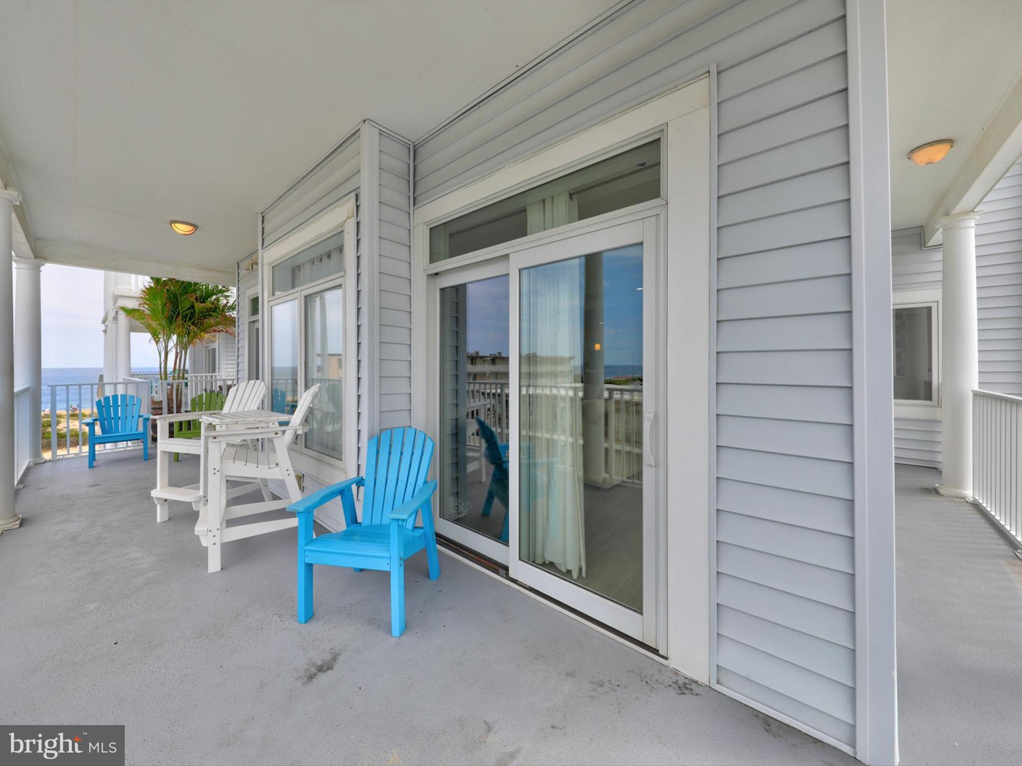 5 87th Street, Unit 303 Ocean City, MD 21842 - Photo 47 of 49 a building outdoor space with patio furniture