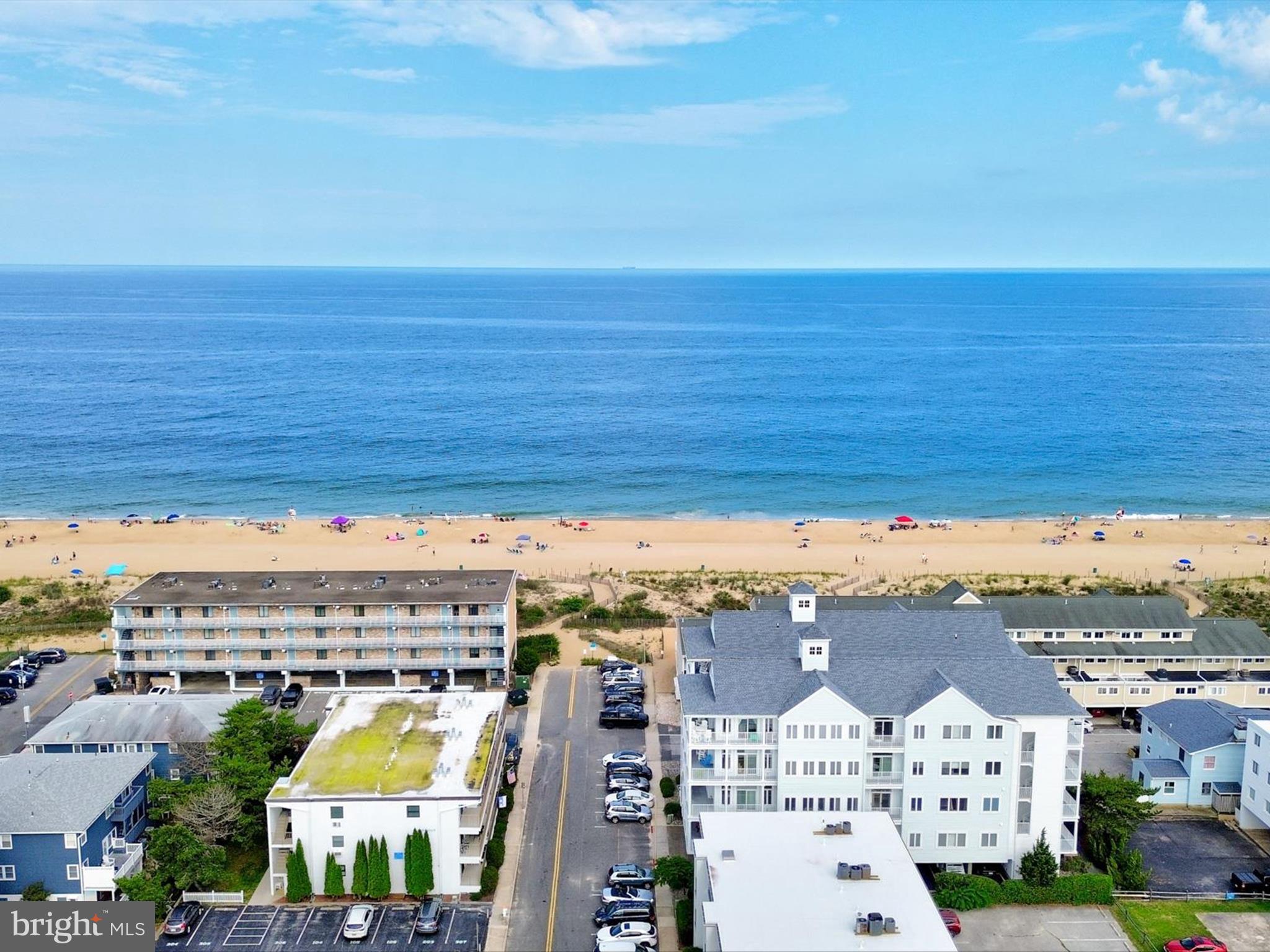5 87th Street, Unit 303 Ocean City, MD 21842 - Photo 49 of 49 an aerial view of residential building and parking space