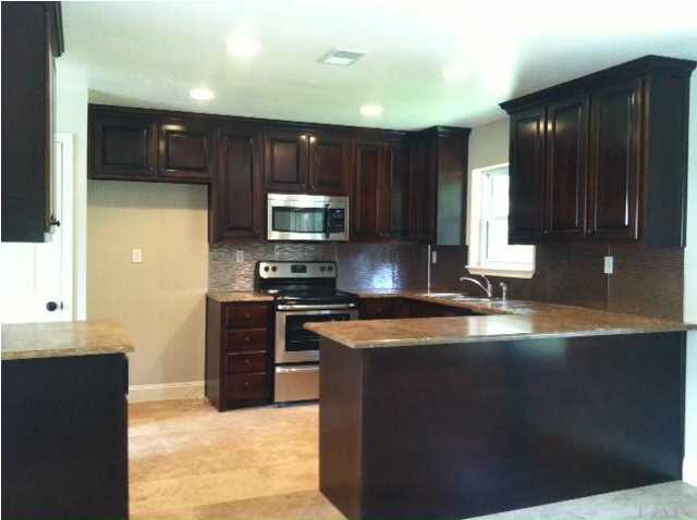 5966 Colter Road Milton, FL 32583 - Photo 3 of 13 Newly updated kitchen with stainless appliances and stanless backsplash.