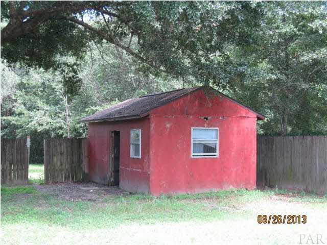 5966 Colter Road Milton, FL 32583 - Photo 4 of 13 Shed, conveys in "as-is" condition.