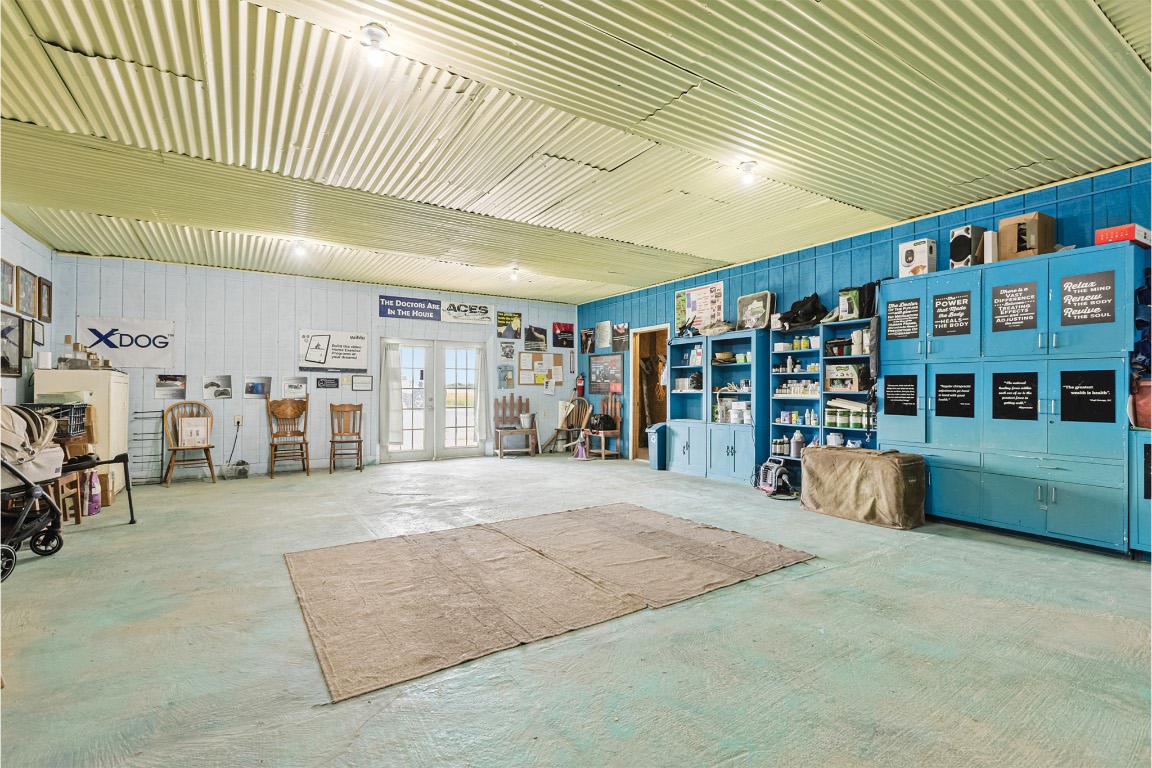 10771 Highway 6 Meridian, TX 76665 - Photo 39 of 40 a room with lots of furniture and a book shelf