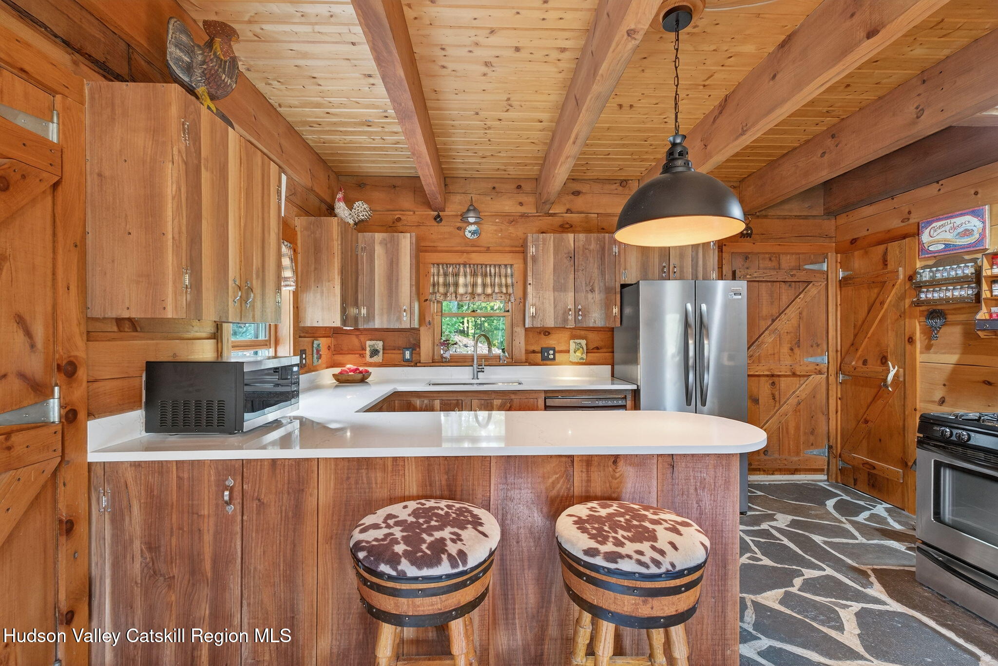52 Paul Horn Road Catskill, NY 12414 - Photo 12 of 53 a kitchen with a table and chairs