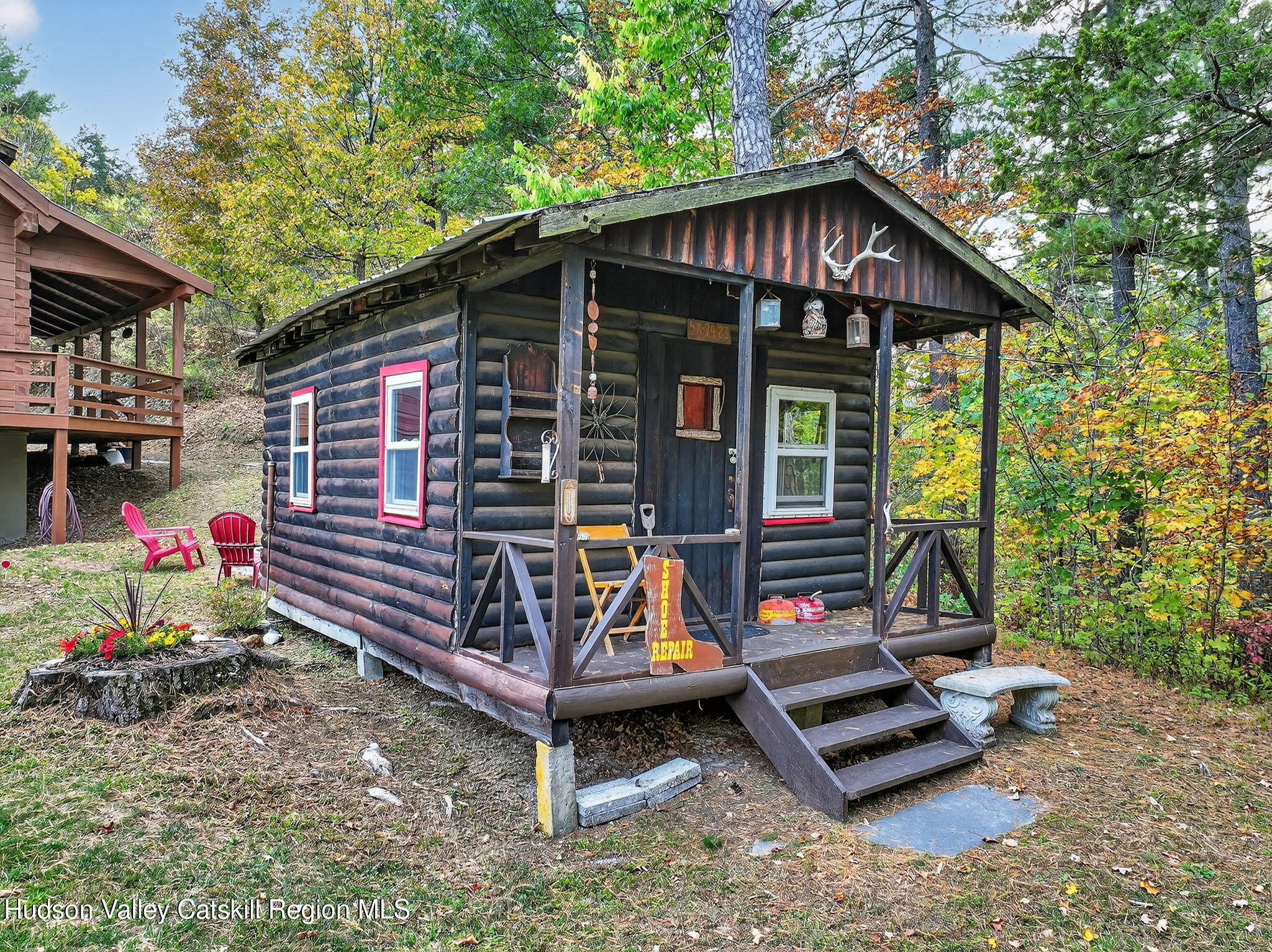 52 Paul Horn Road Catskill, NY 12414 - Photo 46 of 53 a view of a small house with wooden deck front of house