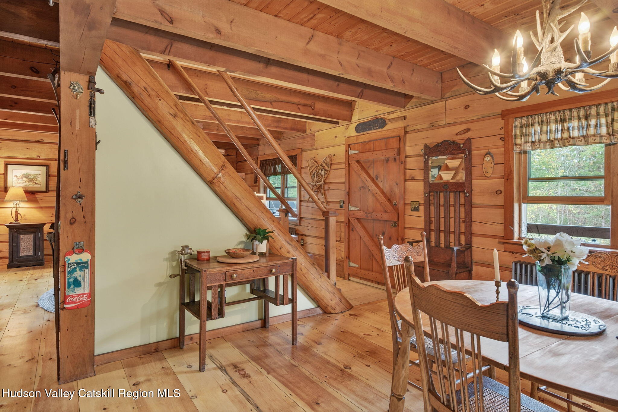 52 Paul Horn Road Catskill, NY 12414 - Photo 5 of 53 a dining room with furniture and wooden floor