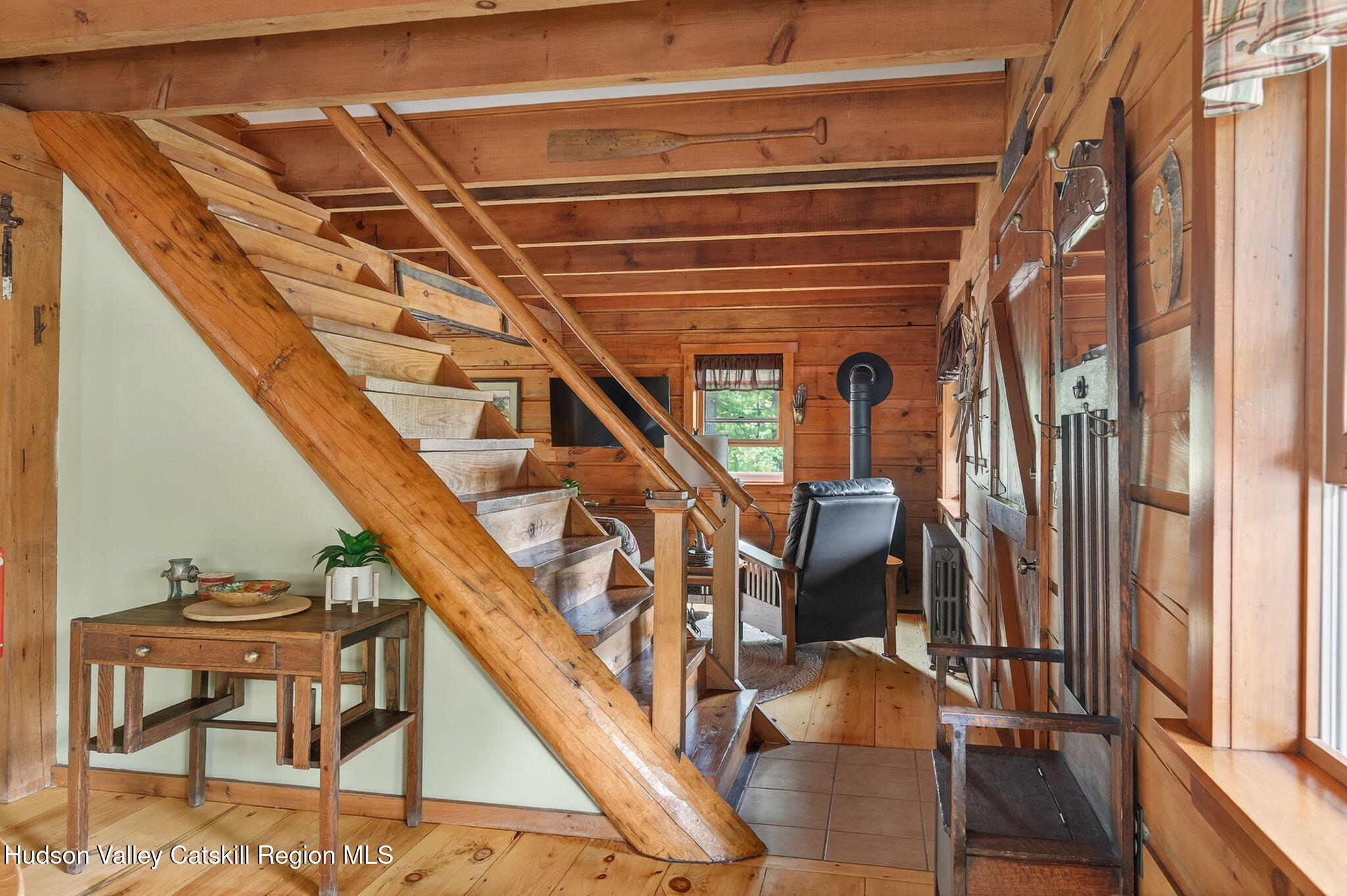 52 Paul Horn Road Catskill, NY 12414 - Photo 7 of 53 a front view of a house with wooden floor and windows