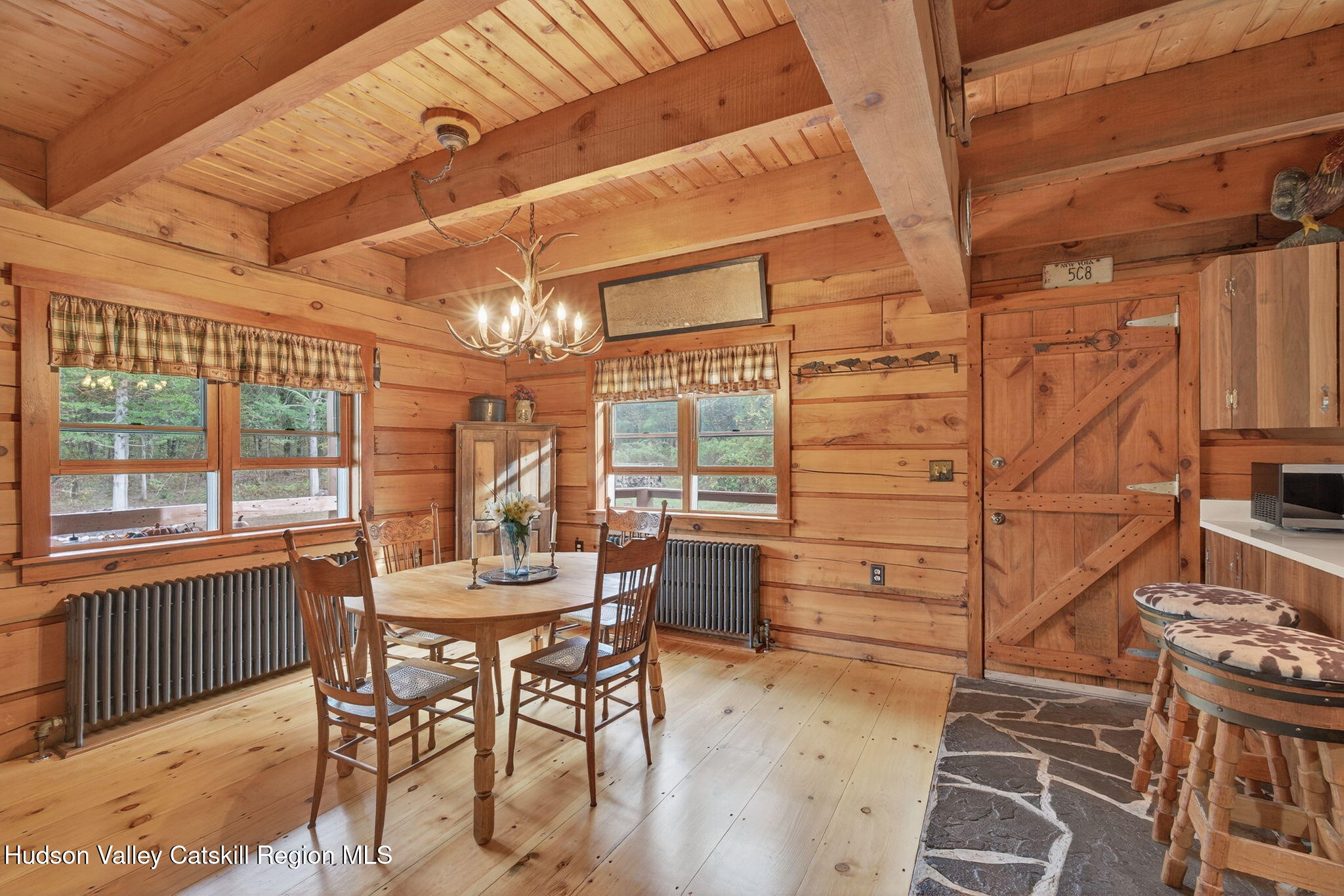 52 Paul Horn Road Catskill, NY 12414 - Photo 8 of 53 a view of a dining room with furniture window and outside view