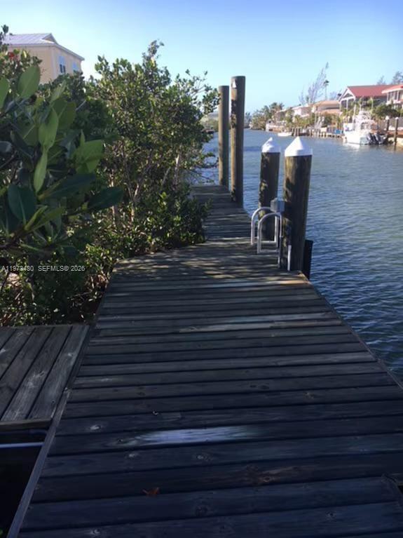 227 Sombrero Beach Road Marathon, FL 33050 - Photo 17 of 56 a view of a terrace with outdoor seating