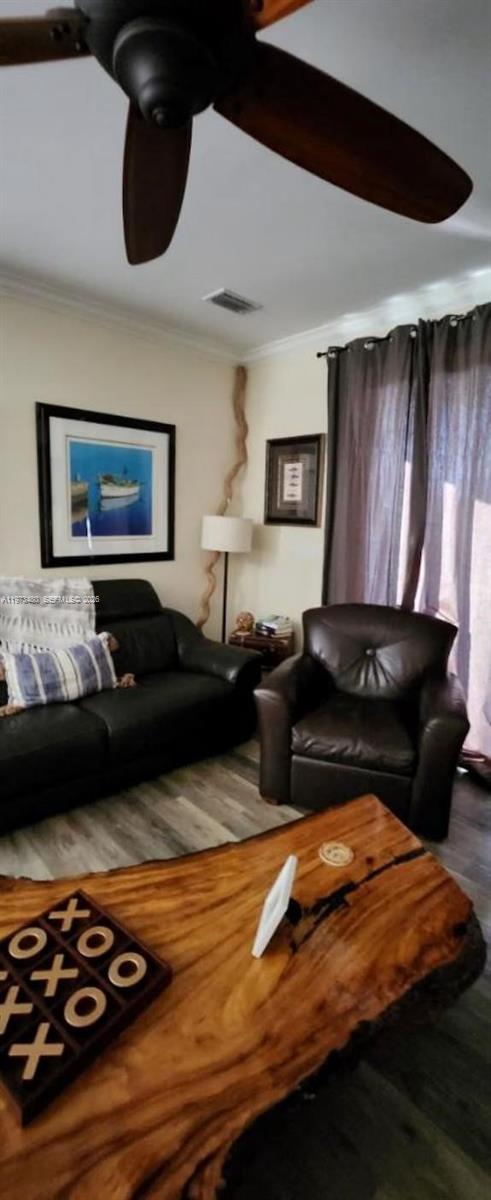 227 Sombrero Beach Road Marathon, FL 33050 - Photo 26 of 56 a living room with furniture and a rug