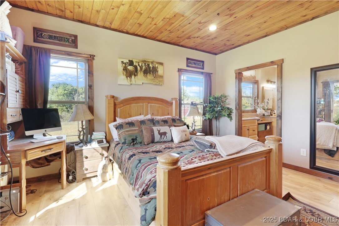 118 Uncle Dee Road Brumley, MO 65017 - Photo 22 of 57 Primary suite with bath, huge closet and fireplace