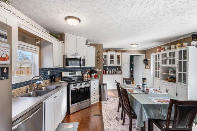 a view of a dining room with furniture