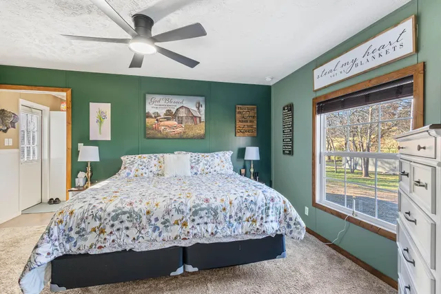 a kitchen with refrigerator cabinets and stove